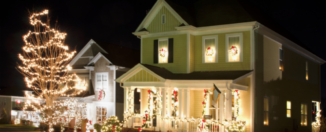 Beautifully lit residential home at night with festive holiday lights powered by solar energy, showcasing Mirasol Solar's sustainable solutions.